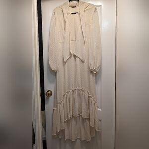 Tie neck asymmetrical lantern sleeve dress size  L 8/10 color off-white /cream